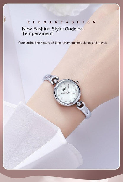 Simple Design Small Exquisite Round Dial Bangle Watch Quartz Watch - Aaryan Malik اريان مالك